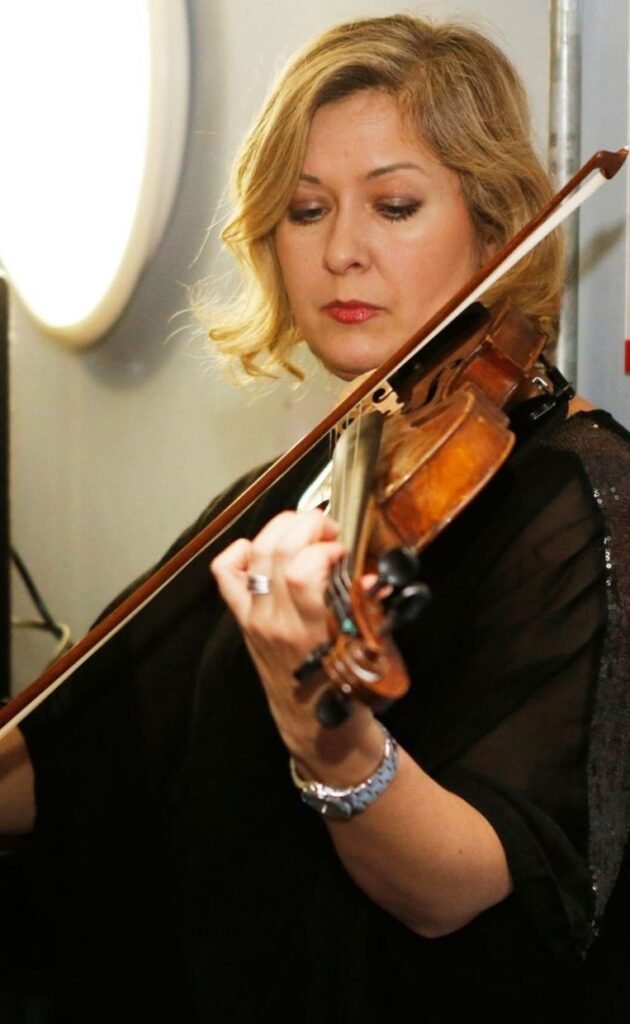 Natalia playing the violin